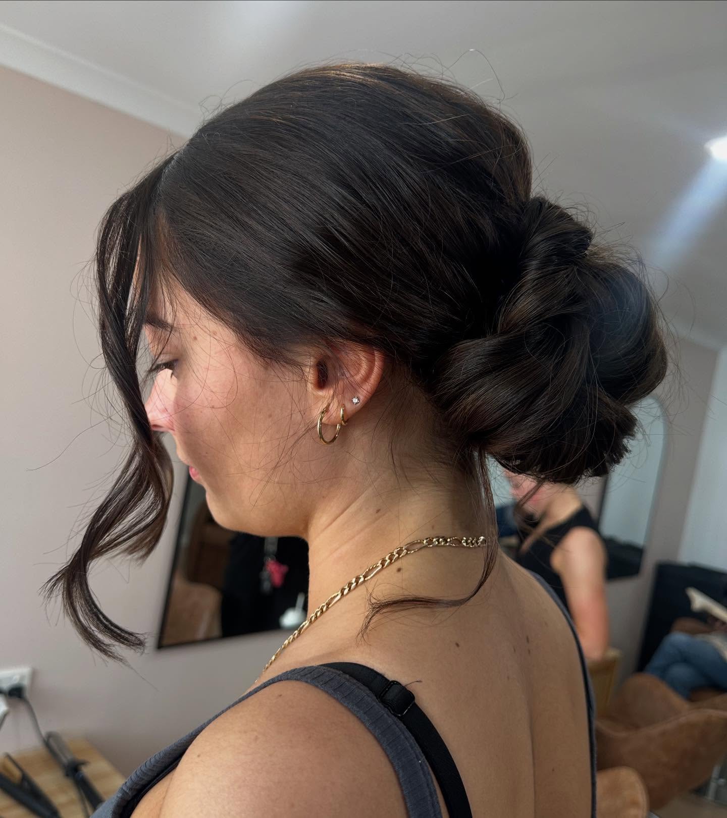 Elegant updo hairstyle for special occasions at Kate Bonnie Hair South Hedland