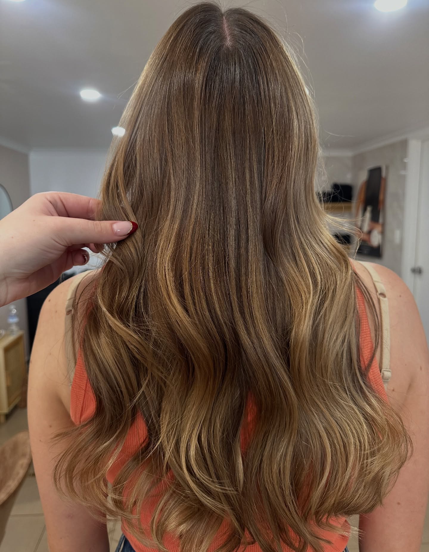 Natural brunette highlights and waves after hair consultation at Kate Bonnie Hair South Hedland