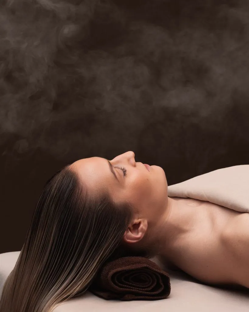 Woman enjoying a relaxing head spa treatment session