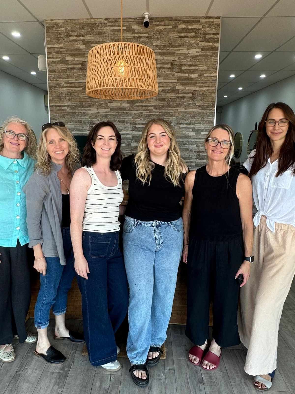 Kate Bonnie with stylists at Mastering Lived-In Techniques hair education class group photo in Mandurah, Perth WA