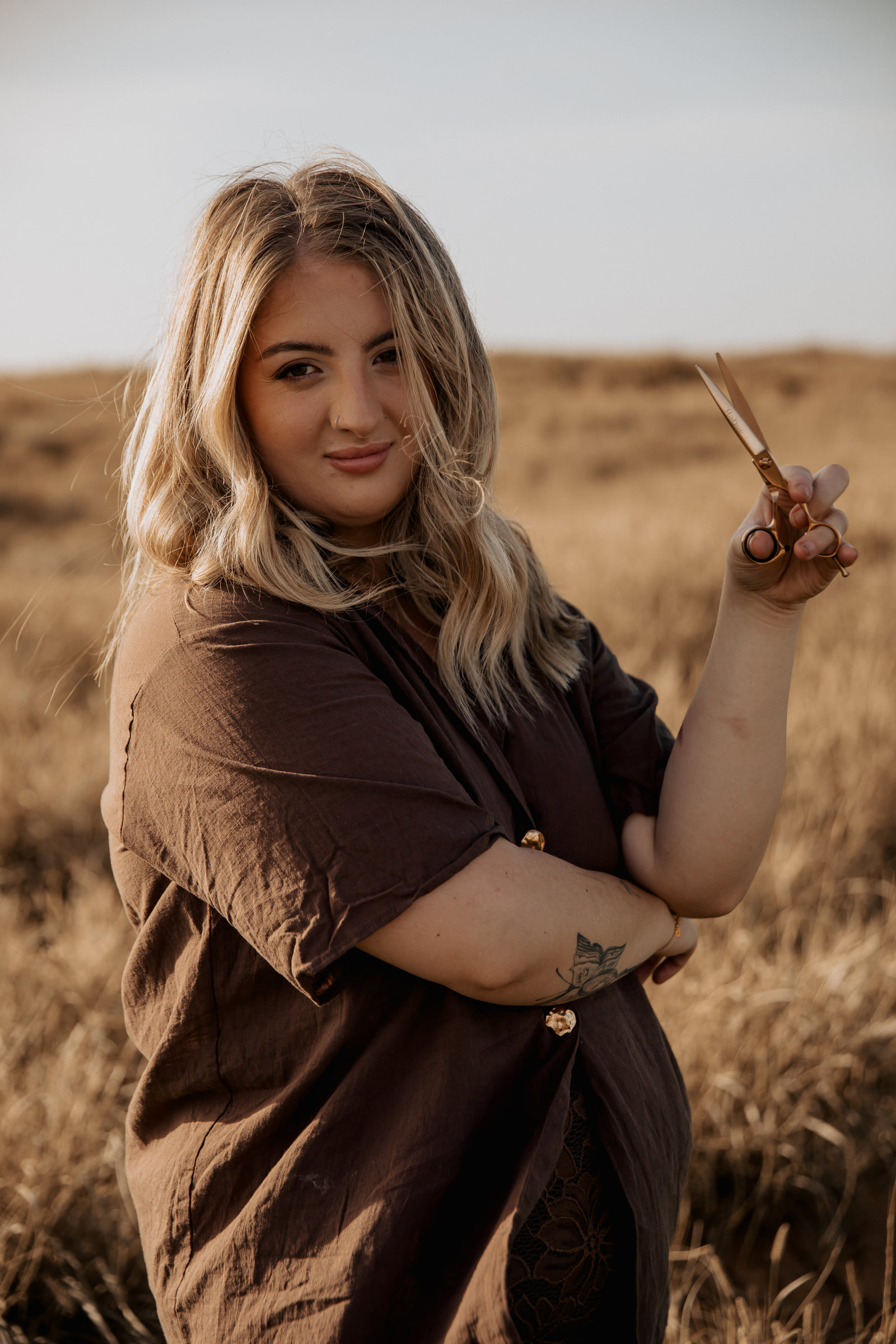 Kate Bonnie hairdresser holding professional scissors portrait in Pilbara South Hedland